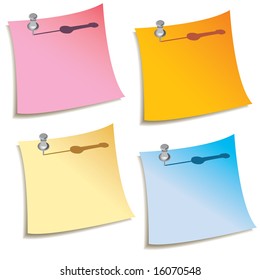 A set of four blank notes with push pins in them