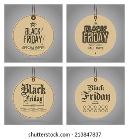 a set of four brown signs with text for black friday