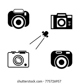 Set of four camera icon. Black camera icon.