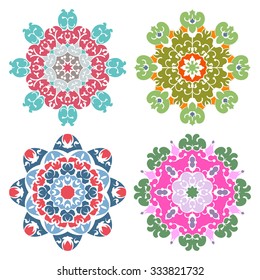 Set of four candy color eastern round ornaments mandalas isolated over white