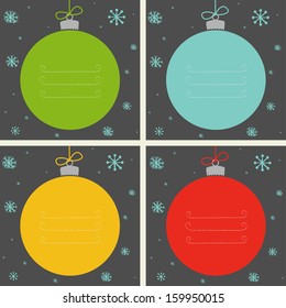 Set of four Christmas baubles in different colors with snowflakes and place for the text.