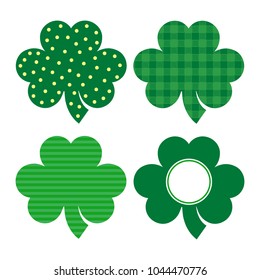 Set of four clovers with different designs, isolated.