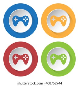set of four colored icons with game pad
