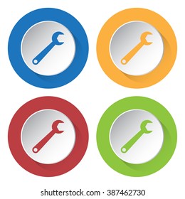 set of four colored icons with spanner