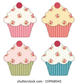 Set of four cupcakes as textile applique with roses in shabby chic style isolated on white background