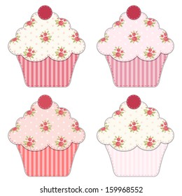 Set of four cupcakes as textile applique with roses in shabby chic style isolated on white background