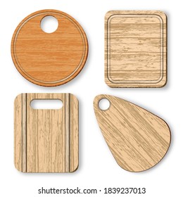 Un conjunto de cuatro placas de cocina de corte.