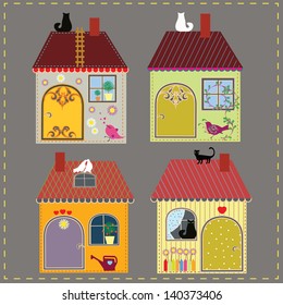 Set of four decorative houses