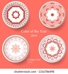 Set of four decorative plates with elegance tribal ornament over background in Living Coral color. Vector illustration, top view, mandala.Trendy concept of the color of the Year 2019.
