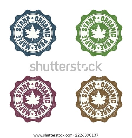Set of four different colours seals with maple syrup isolated on white background