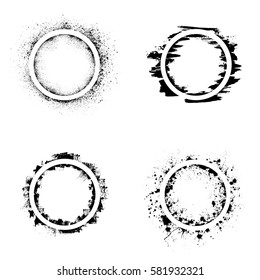 Set of four different grunge circles isolated on white background
