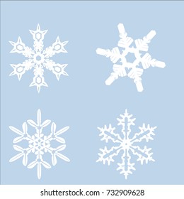 Set of four differets snowflakes white color