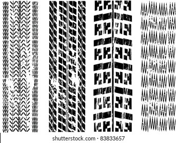 set of four dirty tire tracks