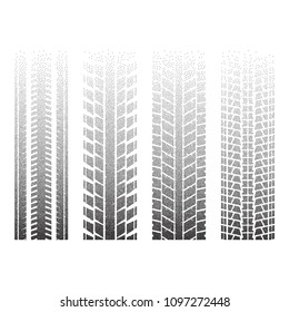 Set of four dotted tire track silhouettes isolated on white background
