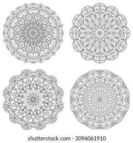 Set of four ethnic round mandala ornaments isolated on white background. Vector illustration. Geometric flower.