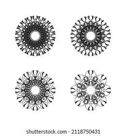 Set of four ethnic round mandala ornaments isolated on white background. Vector illustration. Geometric flower.