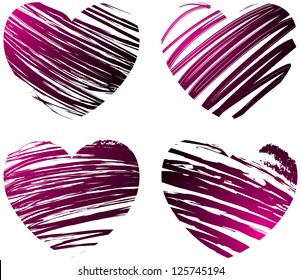 Set of four grunge hearts in pink and black colors
