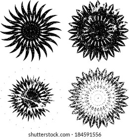 Set of four grunge shapes. Vector illustration. Decorative elements.