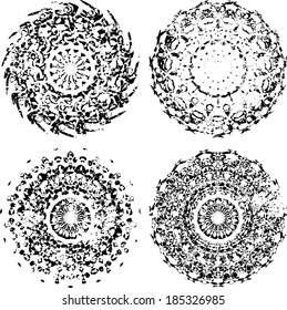 Set of four grunge shapes. Vector illustration. Decorative elements. 