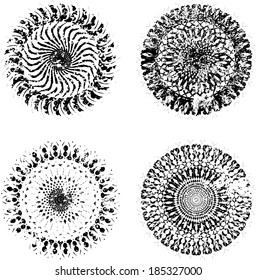Set of four grunge shapes. Vector illustration. Decorative elements. 