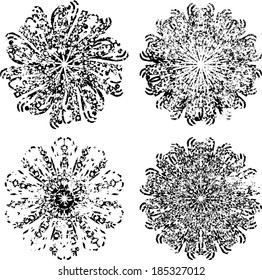 Set of four grunge shapes. Vector illustration. Decorative elements. 