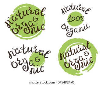 Set of four hand crafted stickers for natural and organic products with handwritten text and realistic green paint drops. Illustration isolated on white