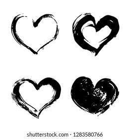 Set of four hand drawn black hearts isolated on white. Grunge heart vector illustration. Rough shapes. Watercolor or acrylic painting effect. Valentine’s day theme. Easy to edit element of design.