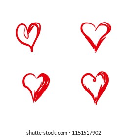 Set of four hand drawn doodle hearts. A red hearts drawn by a free hand. Flat vector template.