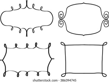 A set of four hand drawn doodle frames.
