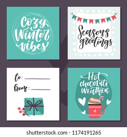 Set of four hand lettered winter holiday cards. Vector illustration 