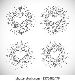 Set of four Hearts with Hand Drawn Vintage Bursting Rays. Retro Design Element. Vector illustration