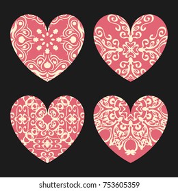 Set of four hearts with ornament. Elements for design, decoration, printing.