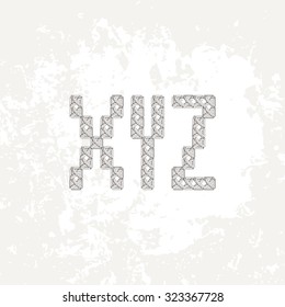 Set of four knitted, embroidered or macrame capital letters of the Latin alphabet. X, Y and Z.