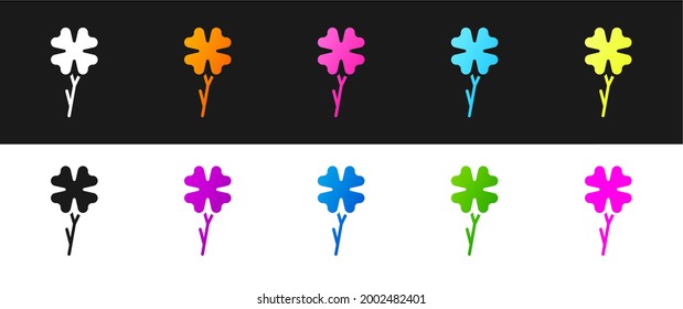 Set Four leaf clover icon isolated on black and white background. Happy Saint Patrick day.  Vector