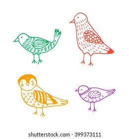 Set of four little hand drawn colored birds. Sketch style