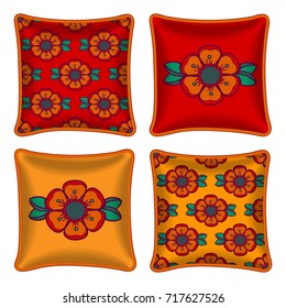 Set of four matching decorative pillows for interior design. Colorful floral pattern in on bright red and orange background. Vector illustration. Four throw pillows, graphic orange flowers.