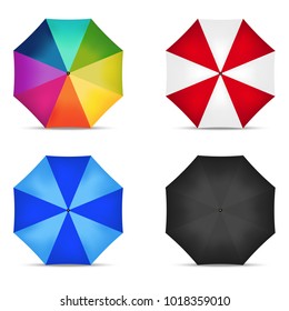 Set of four open multicolored umbrellas on white background - vector illustration