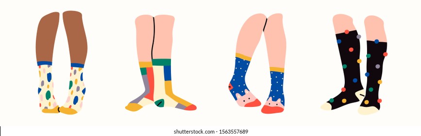 Set of four pairs of female or male legs in the socks. Various poses. Cool prints. Stylish underwear. Fashion accessories. Footwear. Hand drawn vector colored trendy illustration. Flat design