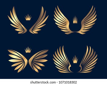 Set of four pairs of gold wings with crowns. Vector illustration.