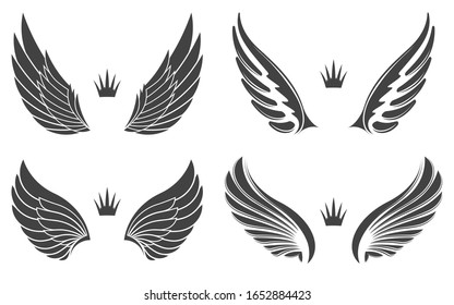 Set of four pairs of wings with crowns.