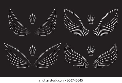 Set of four pairs of wings with crowns on a black background. Vector illustration.