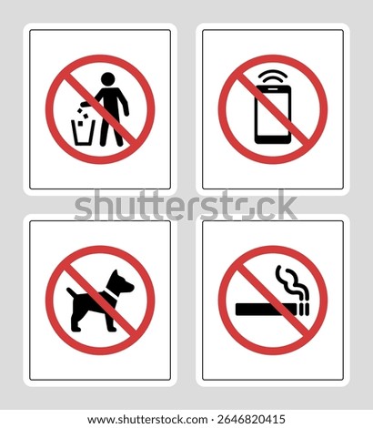 Set of four prohibition signs. No mobile phones, no dogs allowed, and no smoking. Red circle with icons