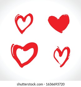 Set of four red freehand drawn hearts. Vector pattern imitation of drawing with a brush.