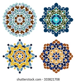 Set of four retro color eastern round ornaments mandalas isolated over white