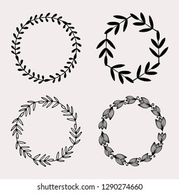 A set of four round frames with floral elements in black isolated on pastel pink background. Elegant and stylish vector design elements, stamps, stickers, labels with space for text.