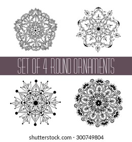 Set of four round hand-drawn decorative vector ornaments