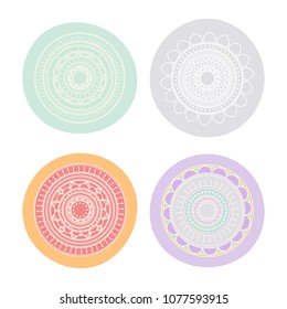 Set of four round shapes with mandala ornament inside. Vector symmetrical pattern illustration.
