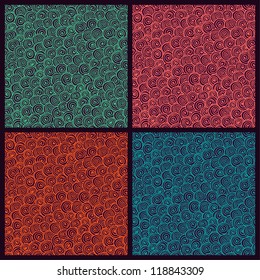 Set of four seamless abstract hand-drawn patterns with spirals. Vector illustration