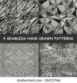 Set of four seamless hand drawn graphic patterns. Made in vector