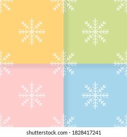 The set of four seamless pattern with the cross-stitch white snowflakes.